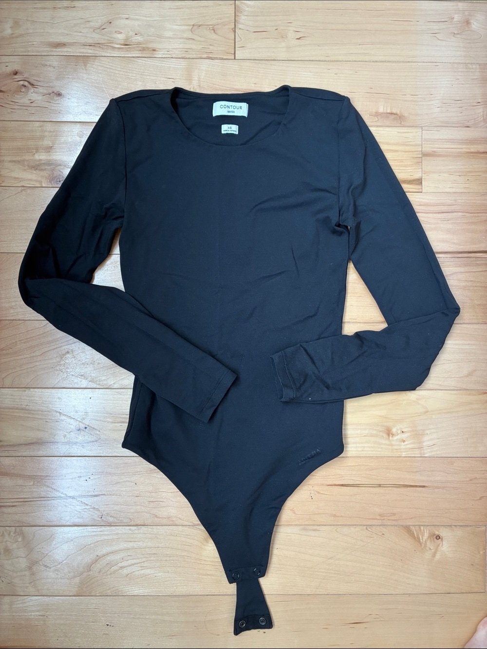 Aritzia Black Long-Sleeve Contour One-Piece Bodysuit